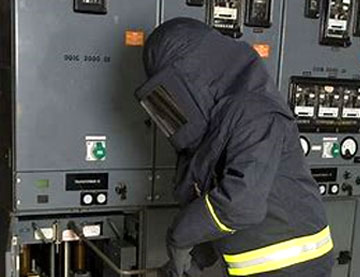 An employee in and arc suit